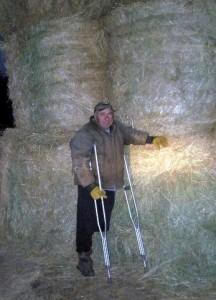 Craig stands with this years harvest of hay