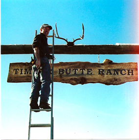 Putting up the sign at Timber Butte Ranch.